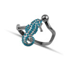 Black plated seahorse ring with turquoise enamel