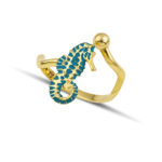 Gold seahorse ring with turquoise enamel