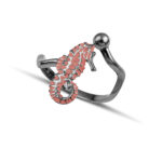 Black plated seahorse ring with pink enamel