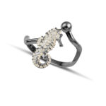 Black plated seahorse ring with white enamel