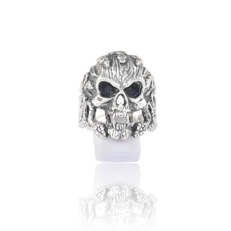 Silver skull ring with snakes